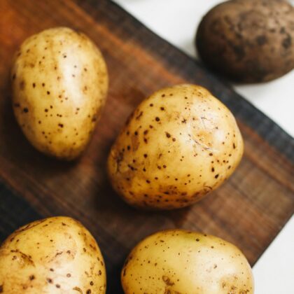 Photo Of Potato On Wooden Surface